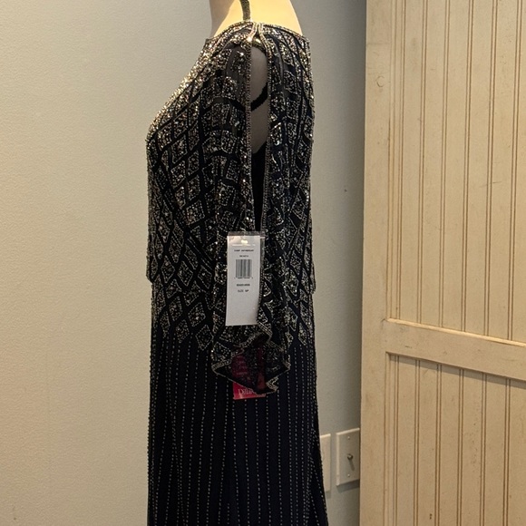 NWT Pisarro Nights beaded split sleeve gown.
6P Navy Blue - Picture 3 of 7
